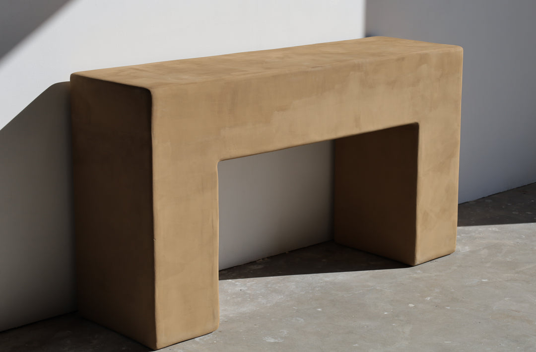 brutalist console table in rammed earth